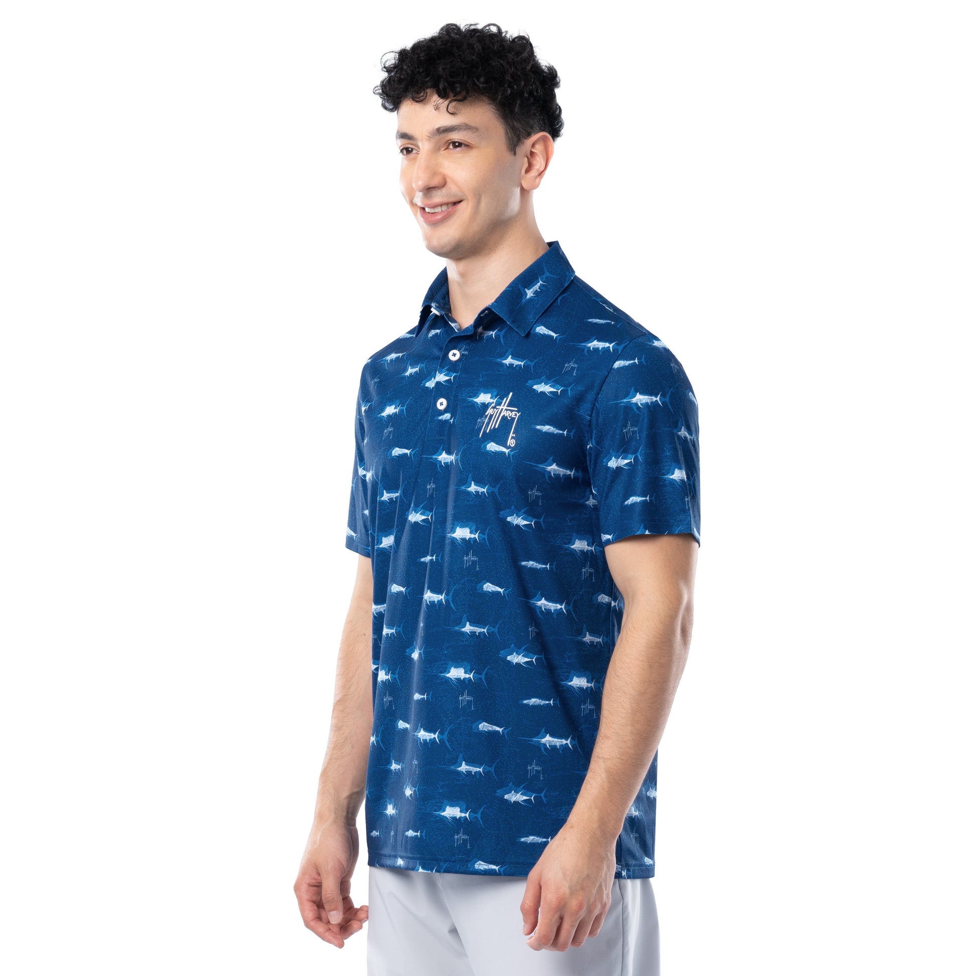 Side view of ocean blue Guy Harvey Men’s Double Vision Printed Polo highlighting athletic fit.