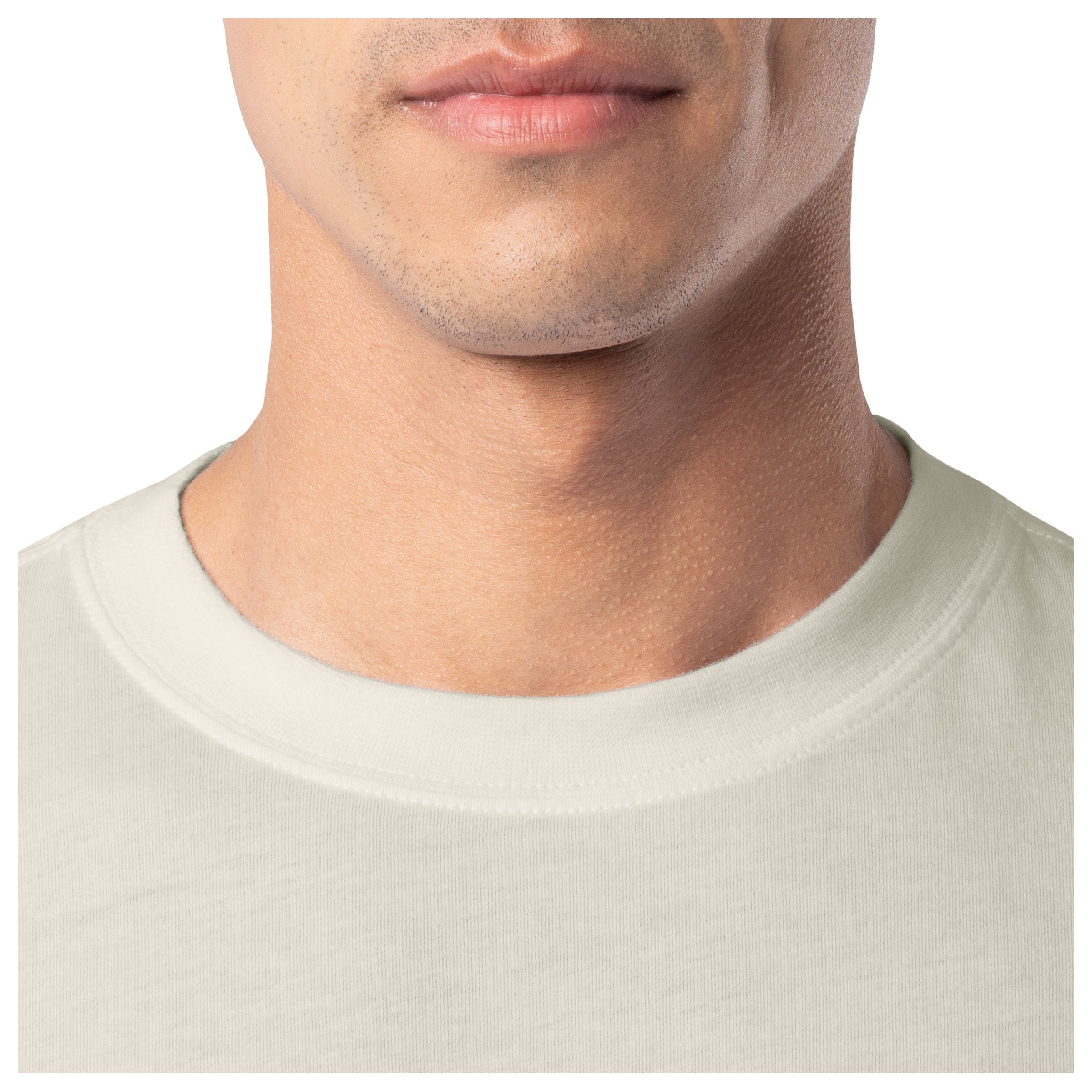 Close-up of a person wearing a beige shirt with a plain background