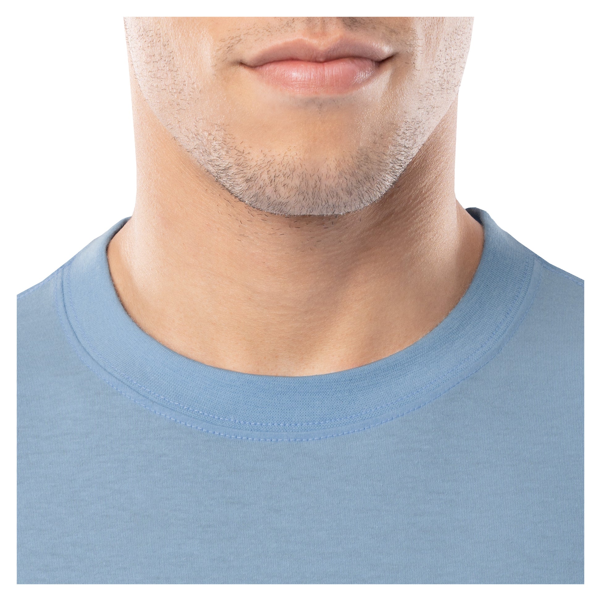 Close-up of a person wearing a light blue shirt with a plain background