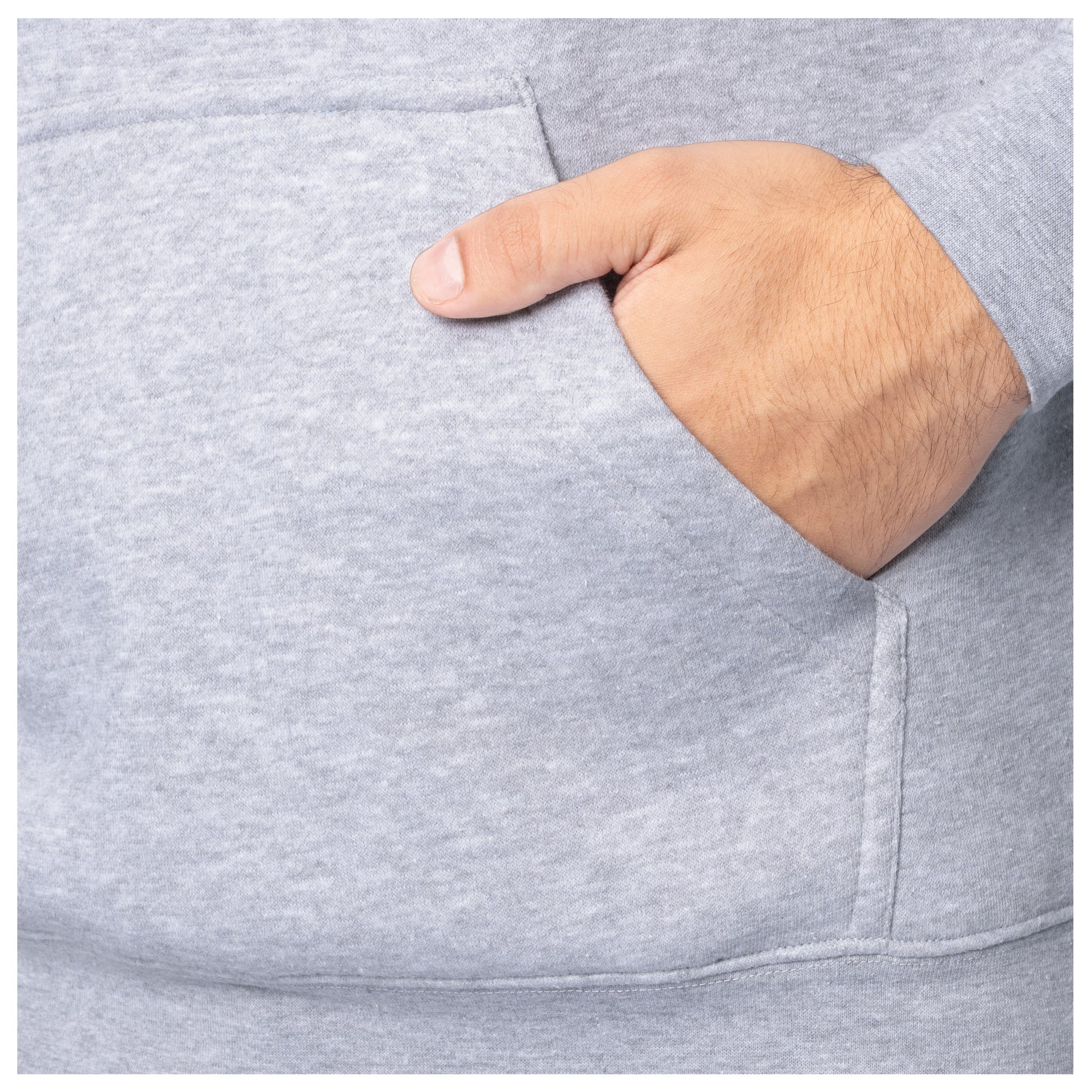 Close-up of a hand in the front pocket of a light gray Guy Harvey fishing fleece hoodie.