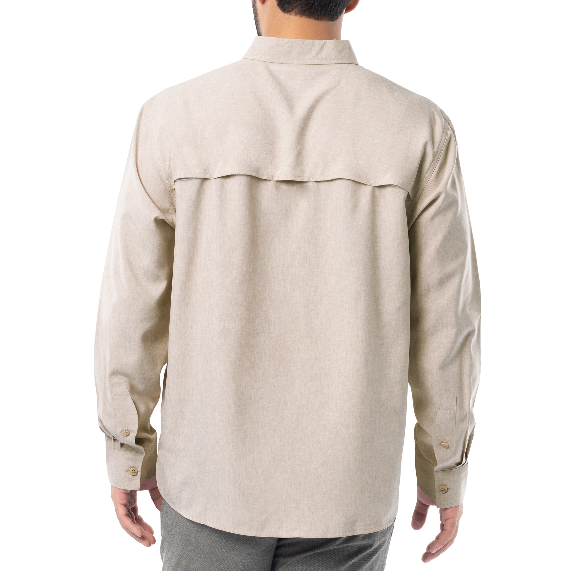 Beige shirt worn by a person on a white background