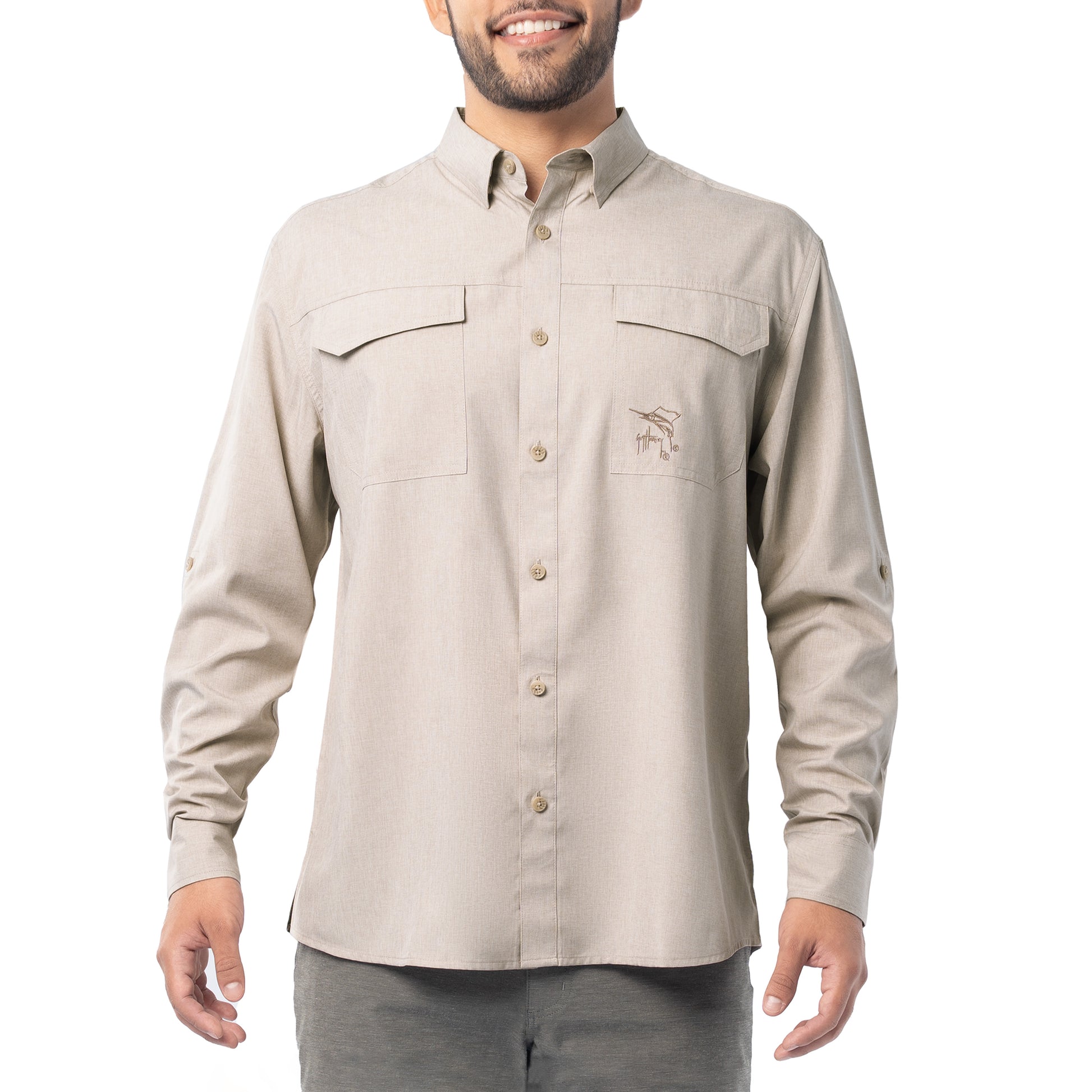 Man wearing a beige button-up shirt with a logo on a white background