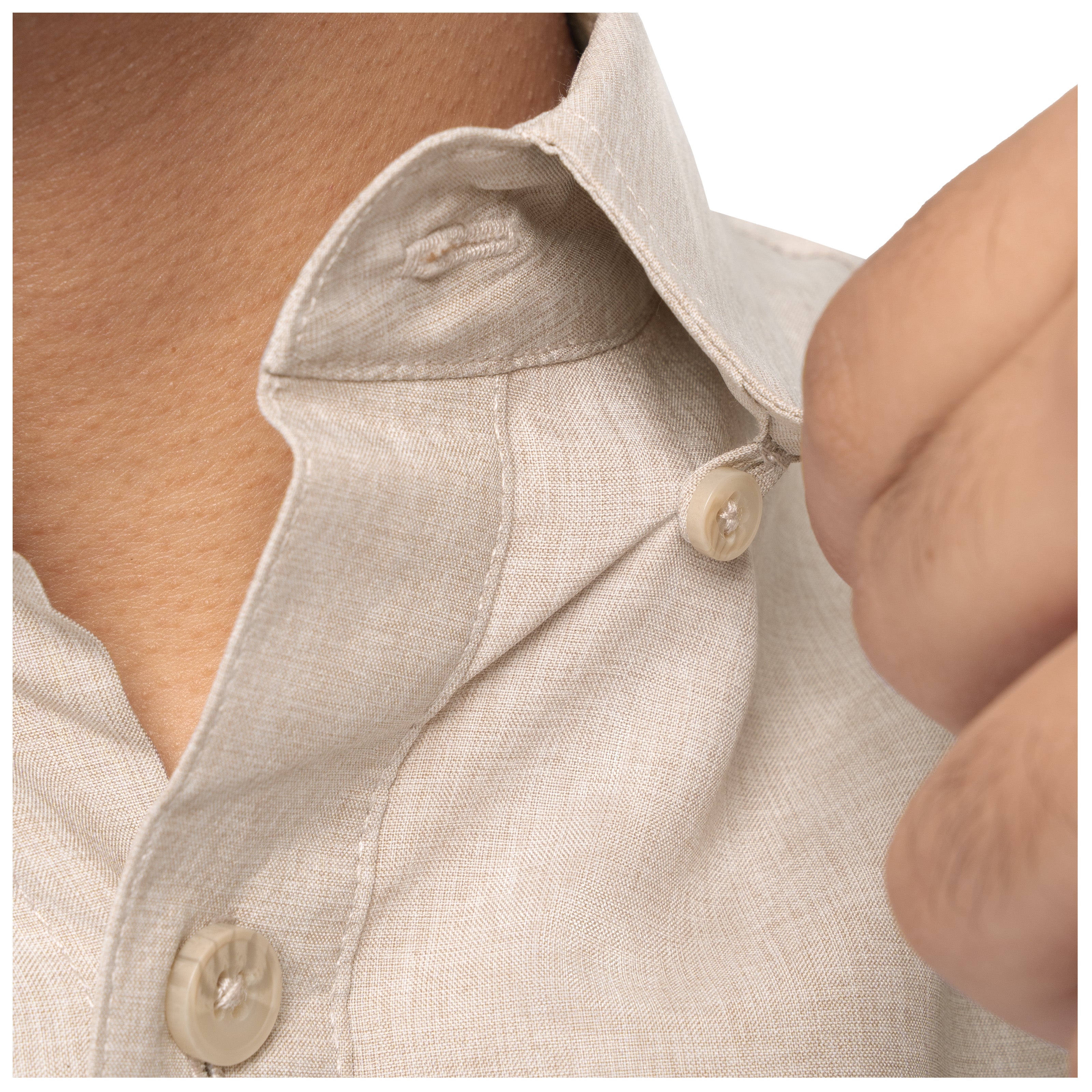 Close-up of a beige linen shirt with buttons