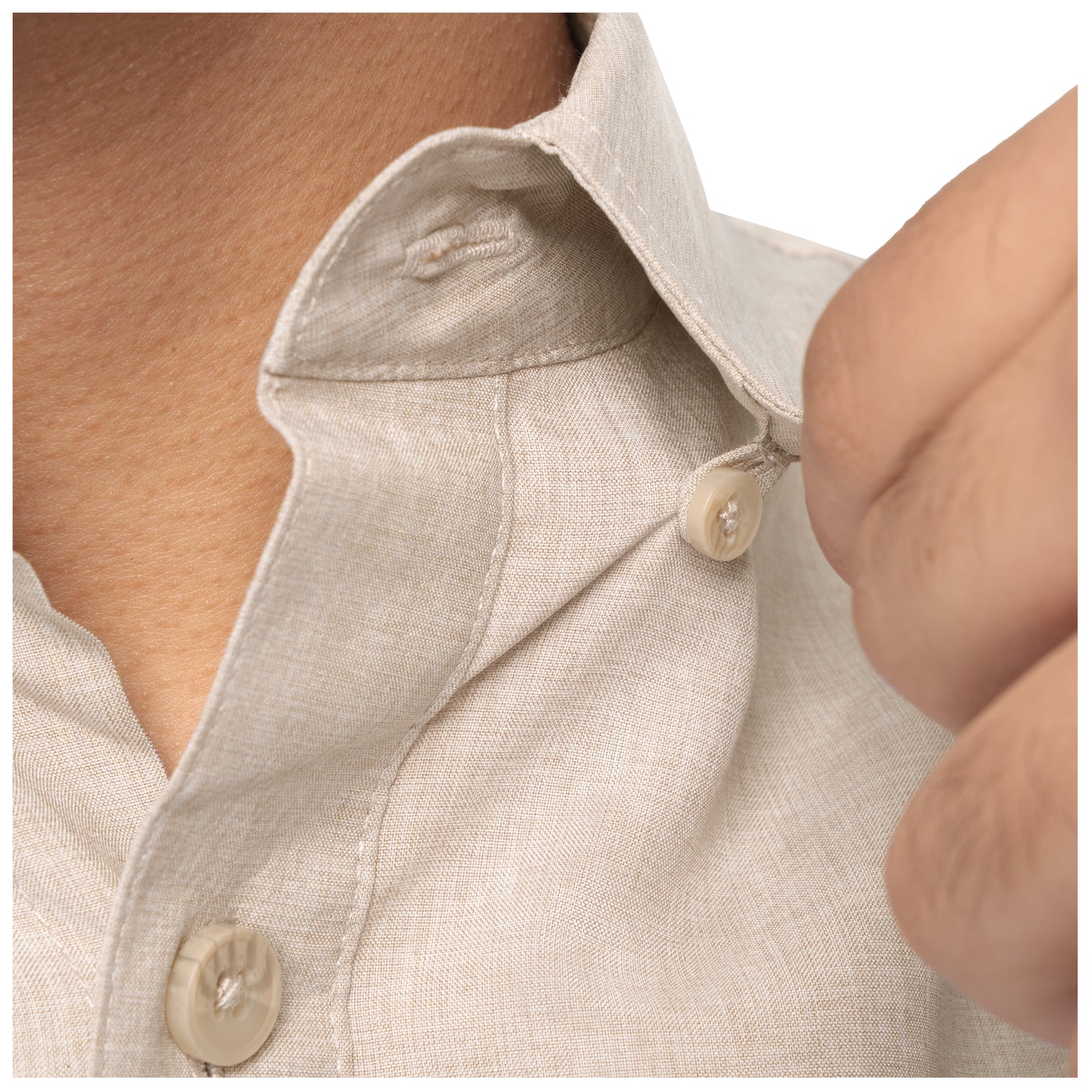 Close-up of a beige linen shirt with buttons