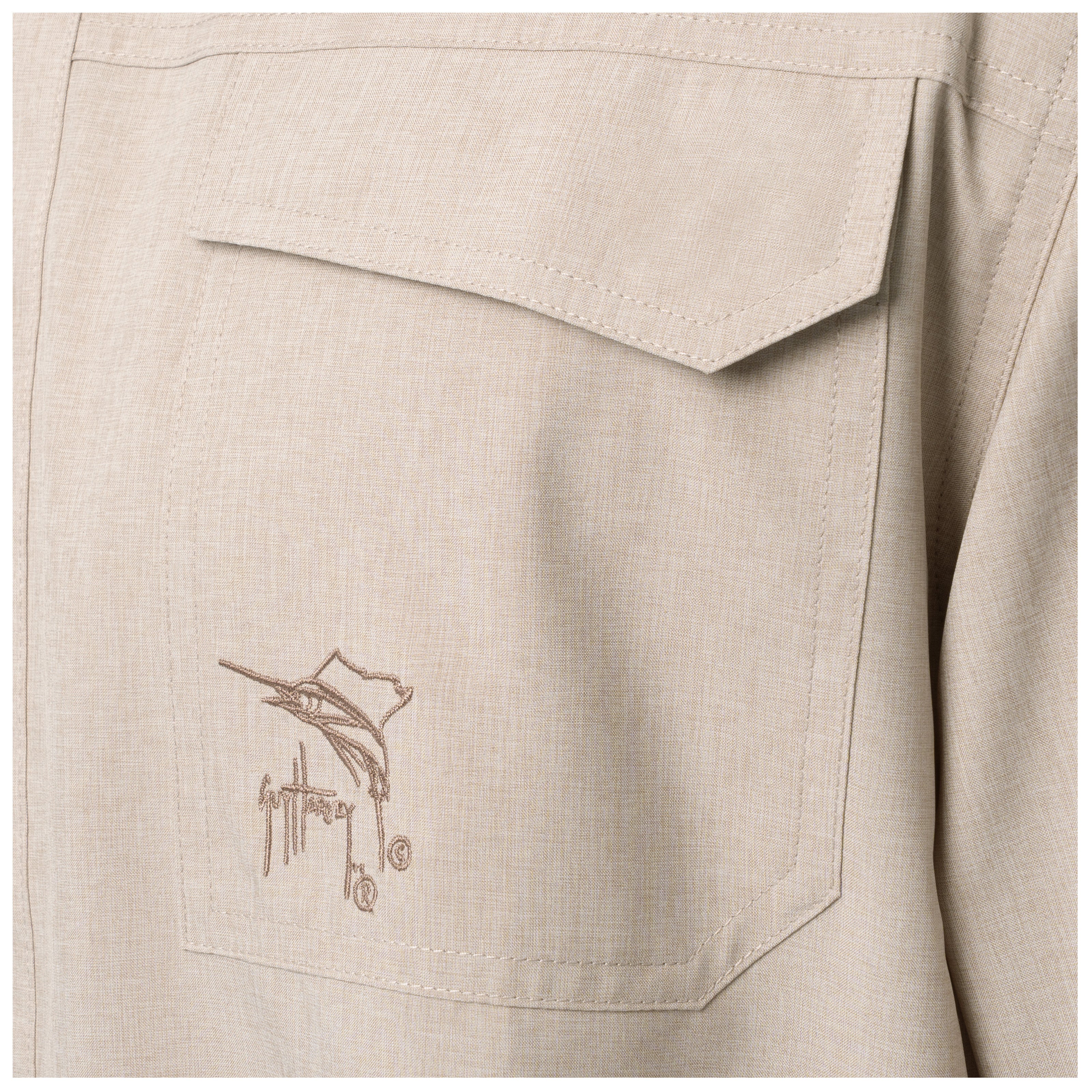 Beige shirt with embroidered logo on a pocket