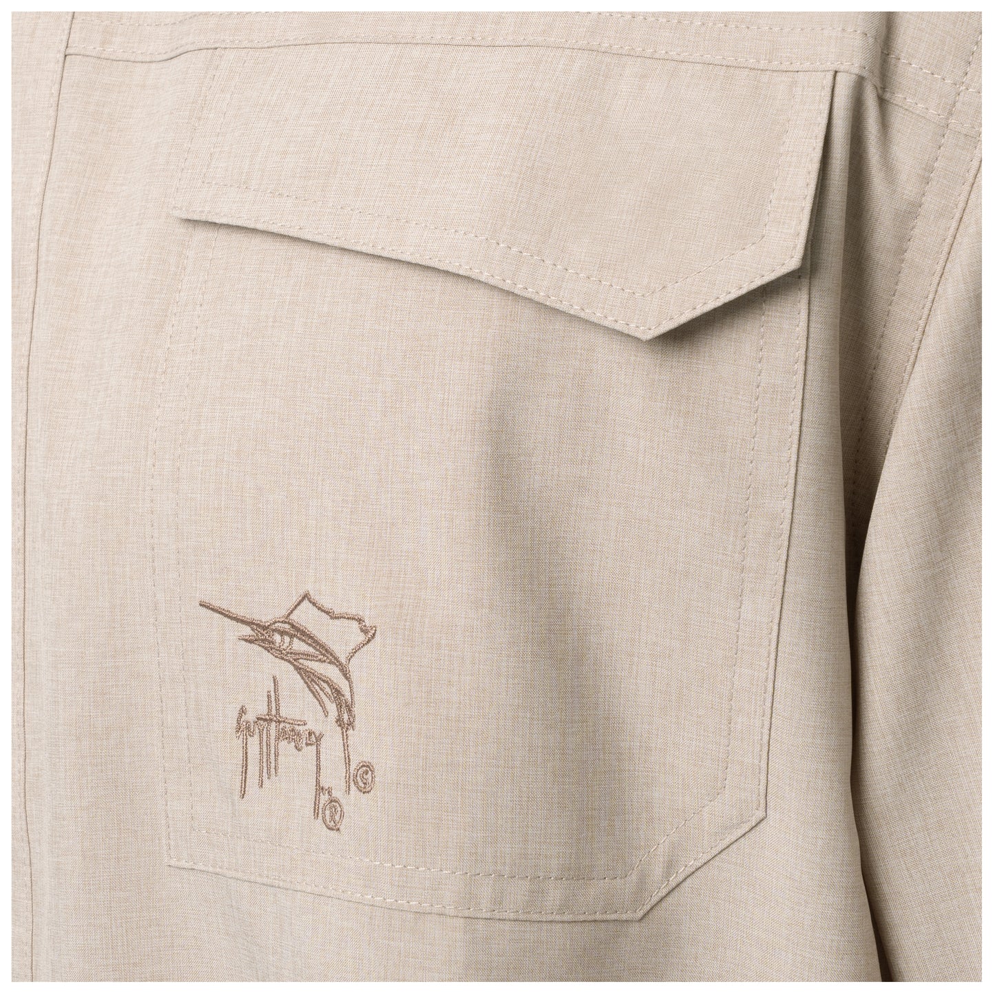 Beige shirt with embroidered logo on a pocket
