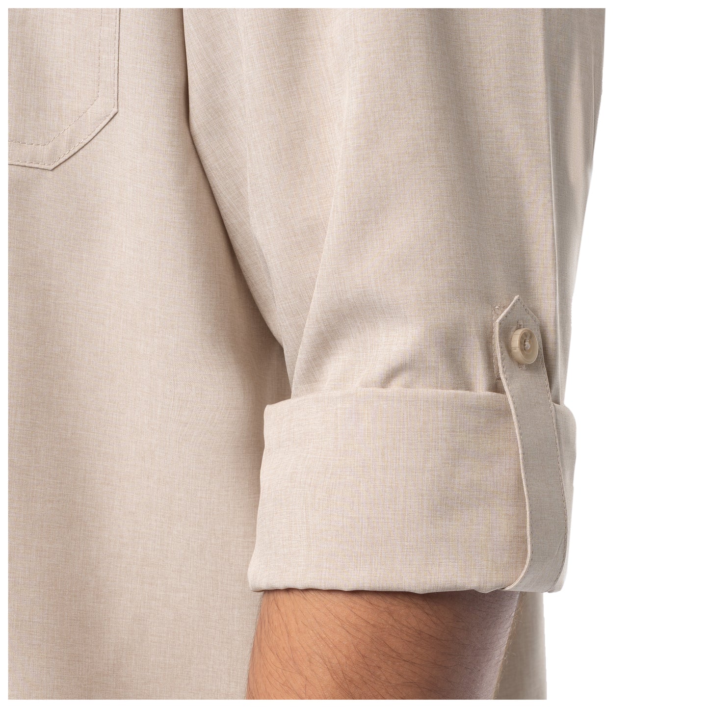 Close-up of a beige shirt with rolled-up sleeve on a white background