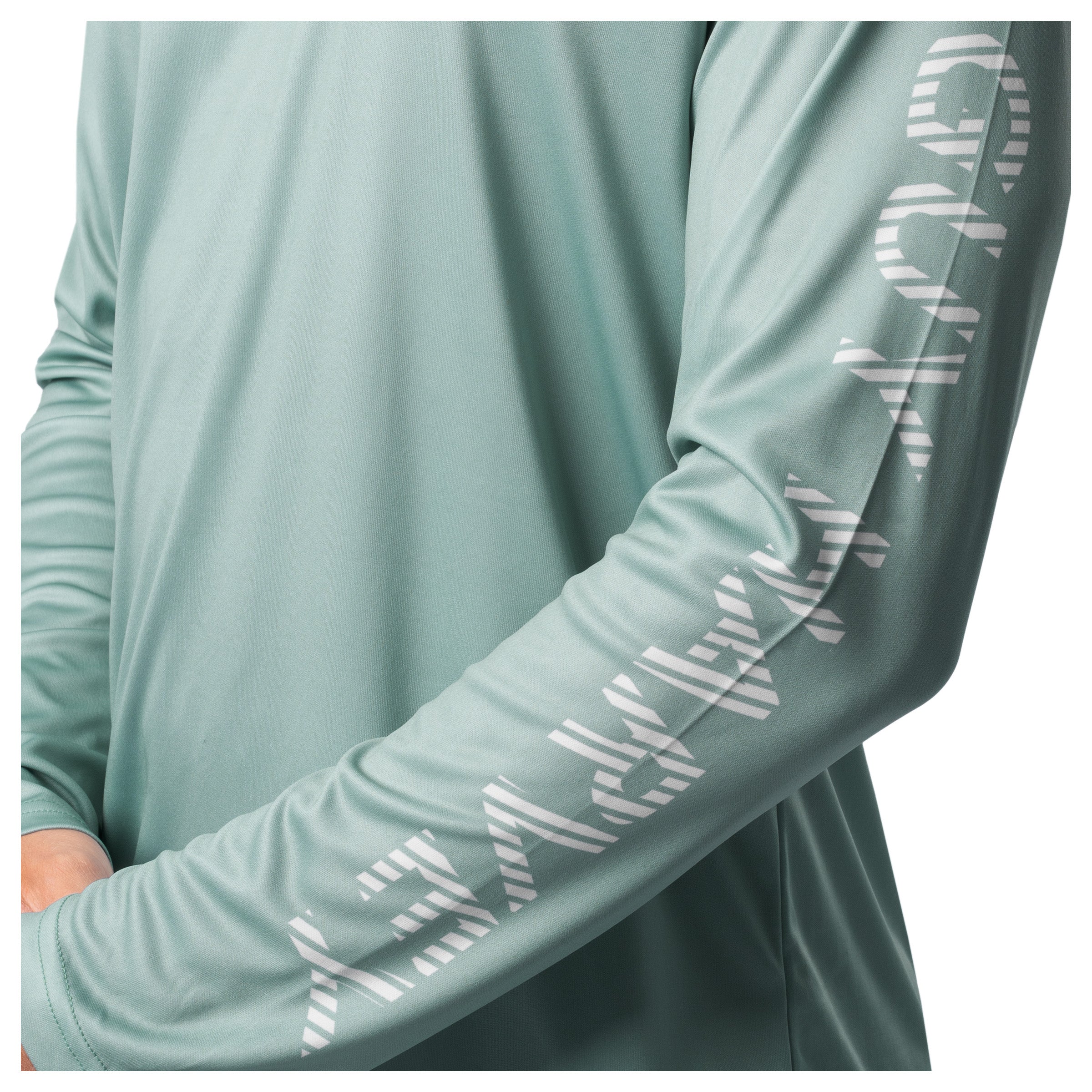 Detail of white Guy Harvey sleeve logo on seafoam green Men’s Mahi Gear Sun Protection Hoodie.