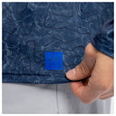 A close-up of the heat seal on a Guy Harvey Mens Marlin Air Sun Protection Top in a topographical print in navy blue