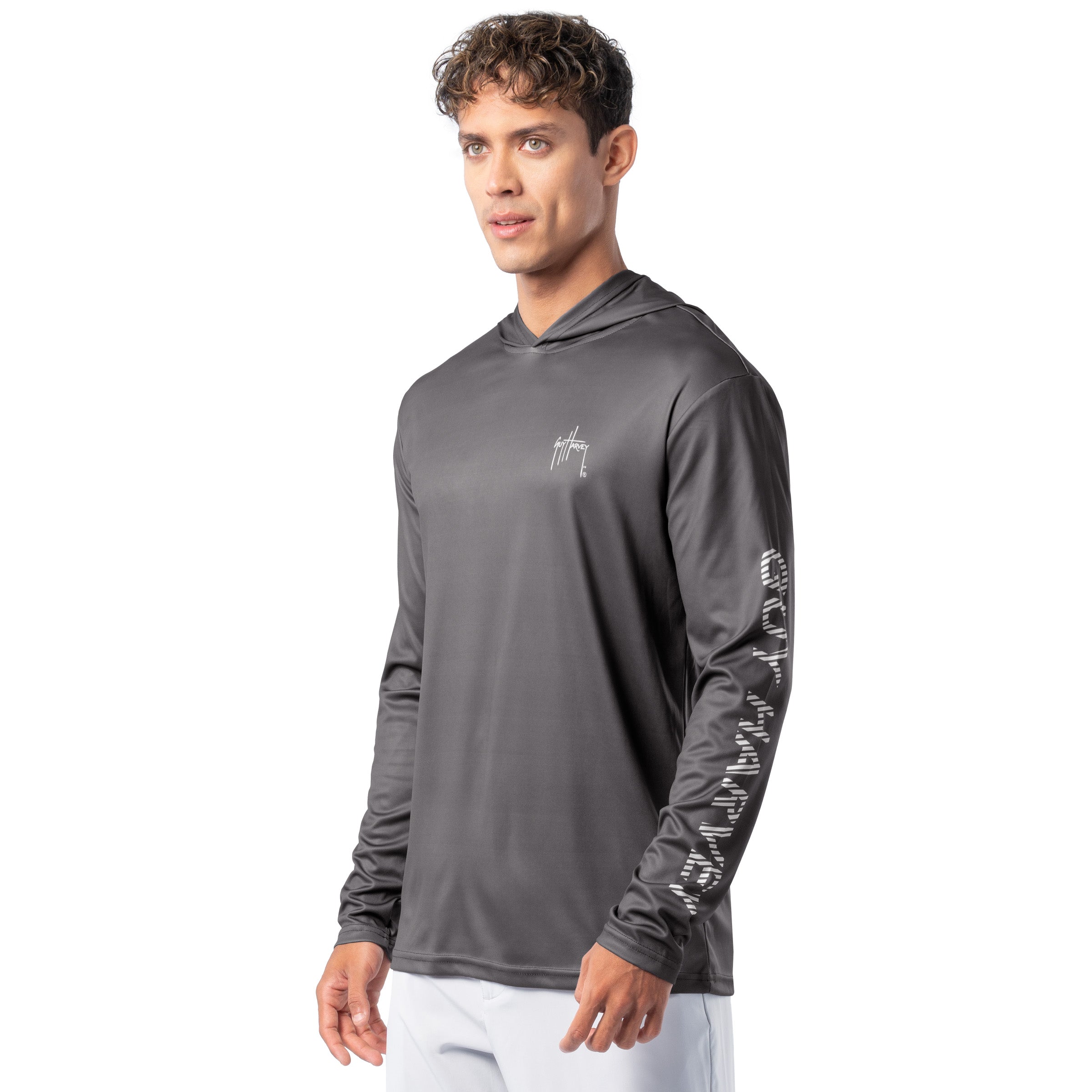 Side angle of charcoal gray Guy Harvey Men’s Rack Hoodie showing sleeve logo and relaxed performance fit.