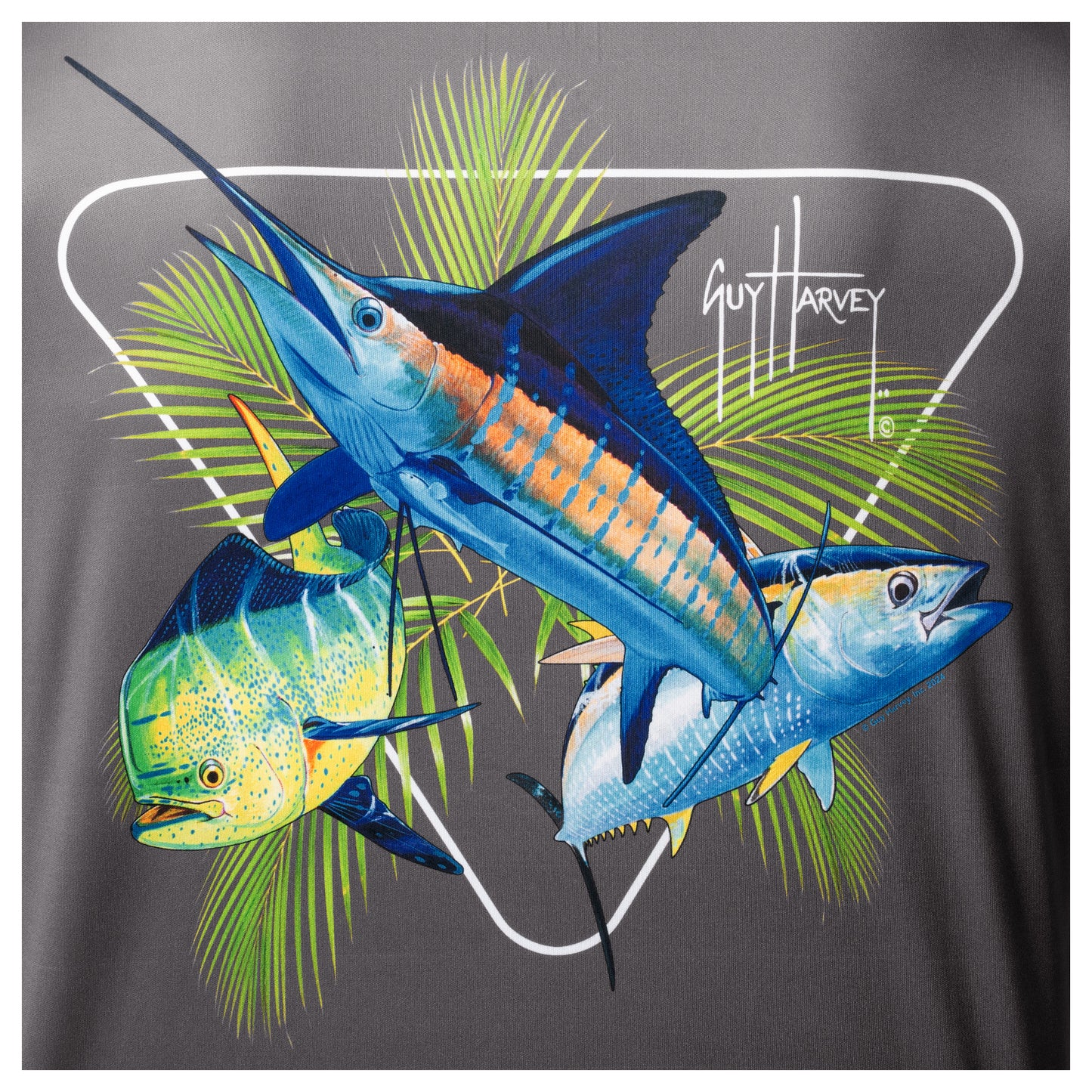 Close-up of Guy Harvey “Rack” artwork with vibrant offshore fish illustration on charcoal gray fabric.