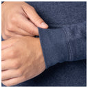 Close-up of sleeve cuff detail on a navy blue Guy Harvey fishing fleece hoodie.