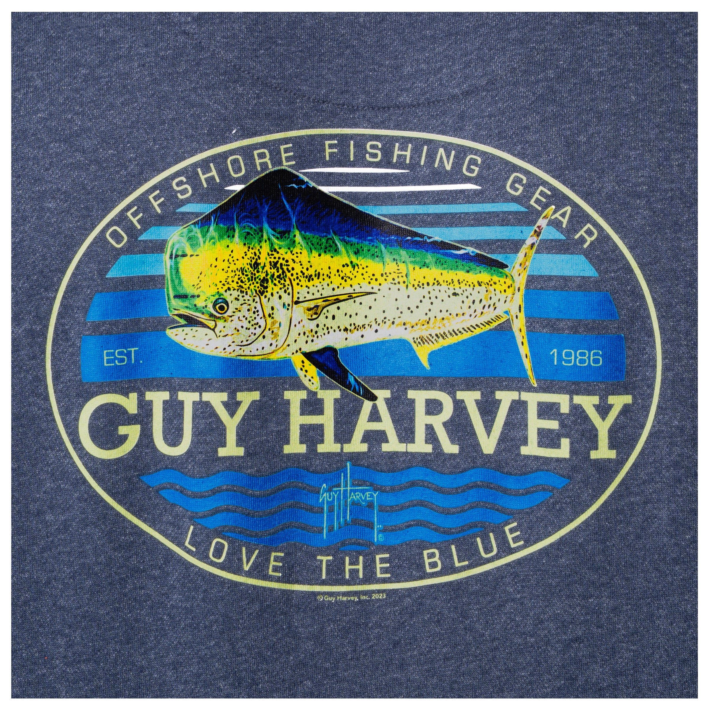 Close-up of the mahi mahi and offshore fishing artwork printed on the back of a navy blue Guy Harvey fishing fleece hoodie.