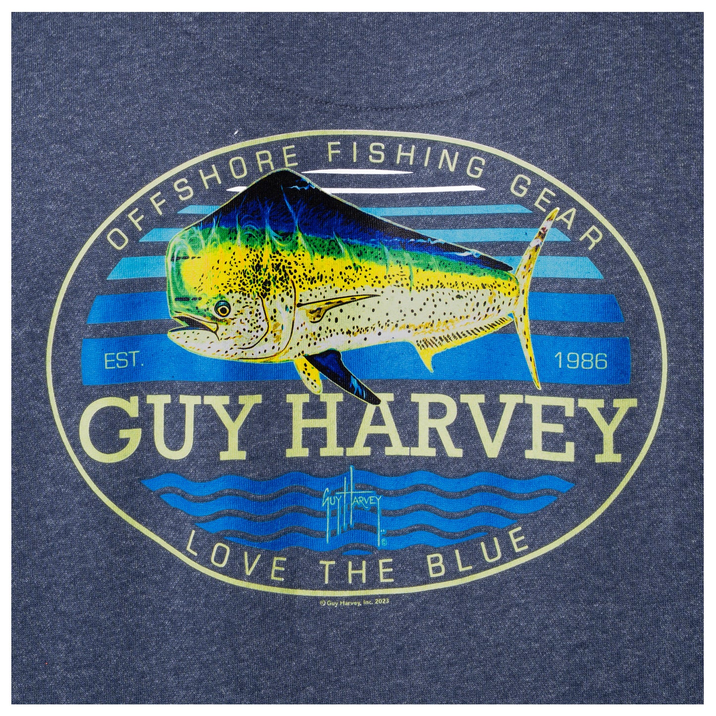 Close-up of the mahi mahi and offshore fishing artwork printed on the back of a navy blue Guy Harvey fishing fleece hoodie.