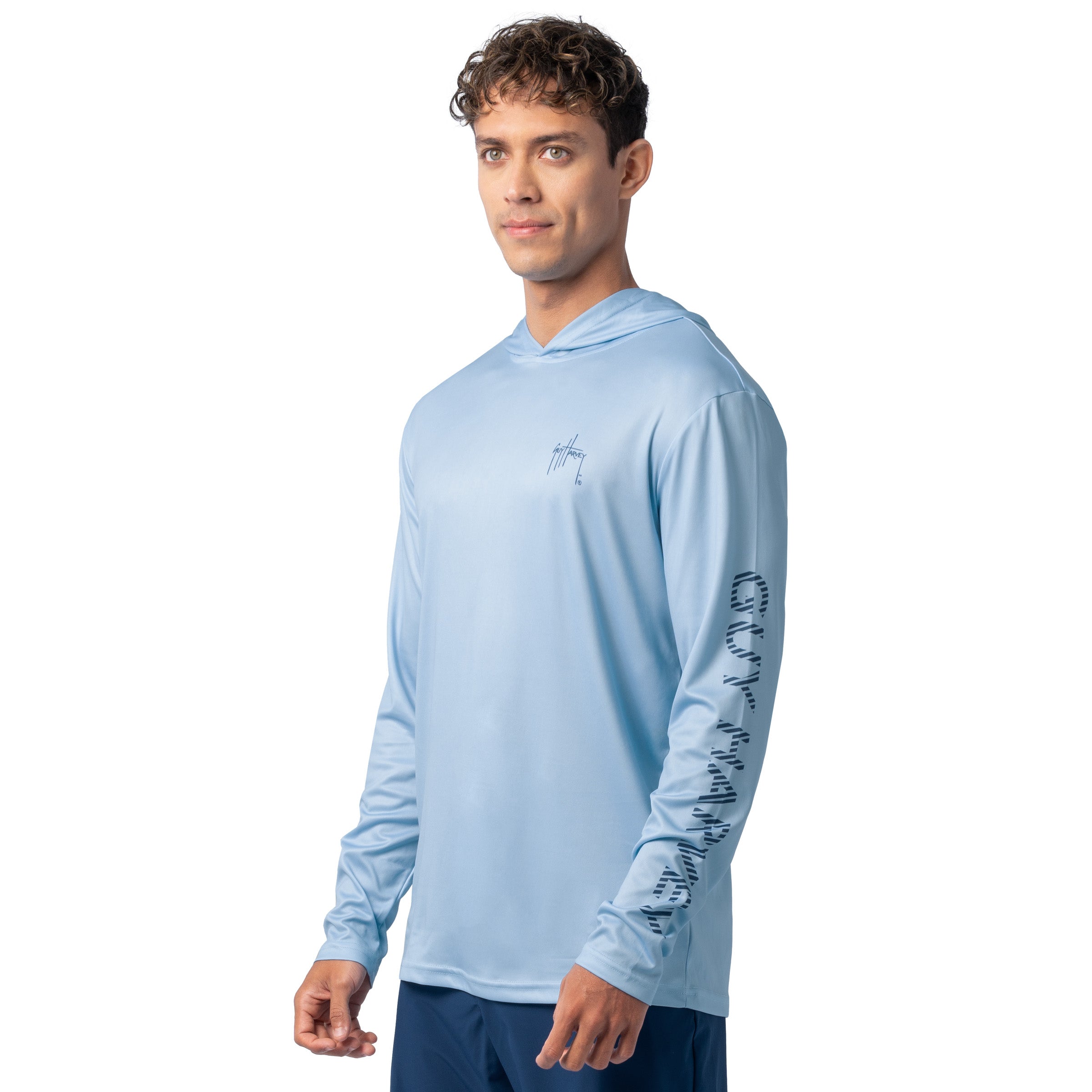 Side angle of light blue Guy Harvey Men’s Sail Stripes Hoodie showing navy sleeve logo and relaxed fit.
