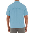 Person wearing a light blue short-sleeve shirt on a white background