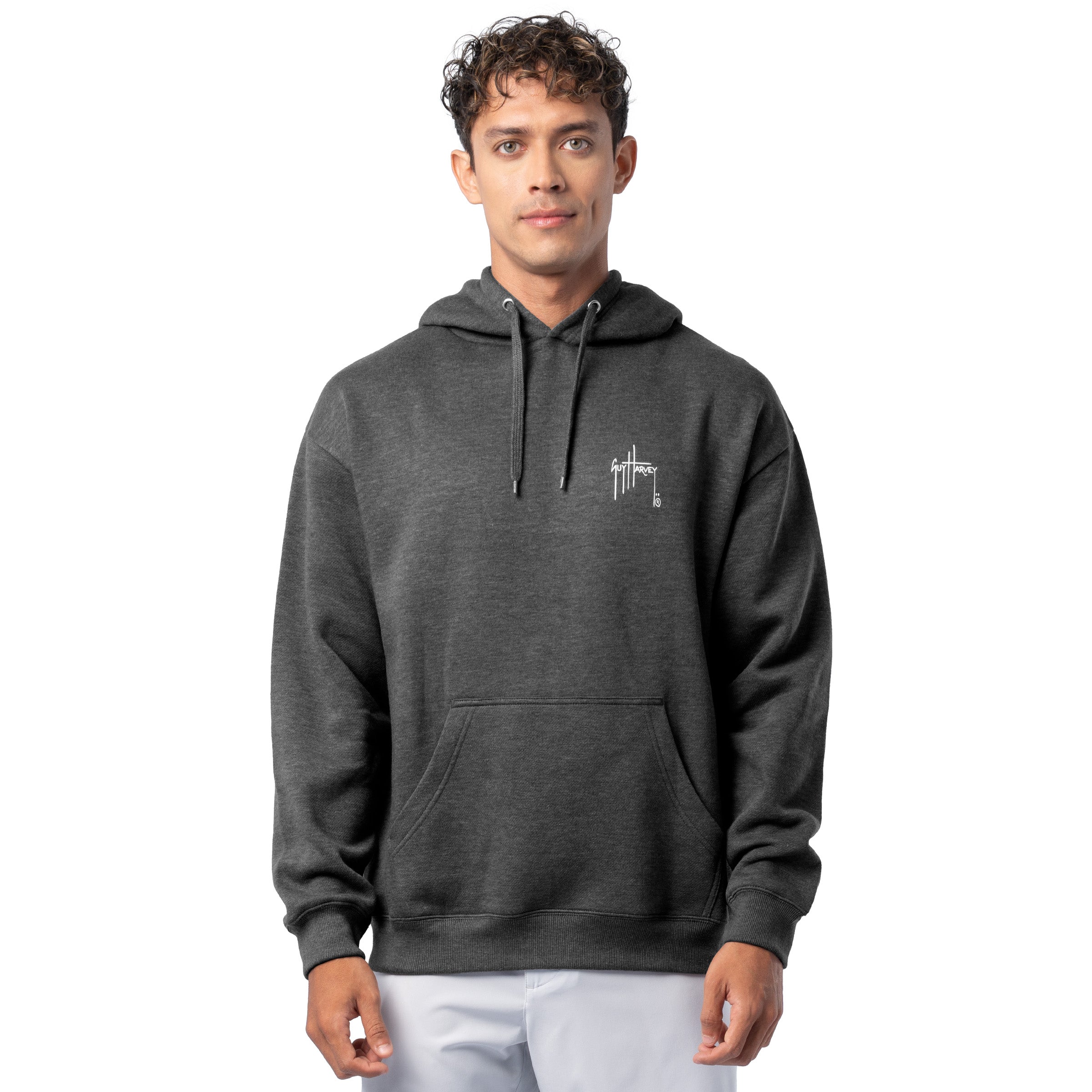 Front view of a man wearing a dark gray Guy Harvey fishing fleece hoodie with the white Guy Harvey logo on the chest.