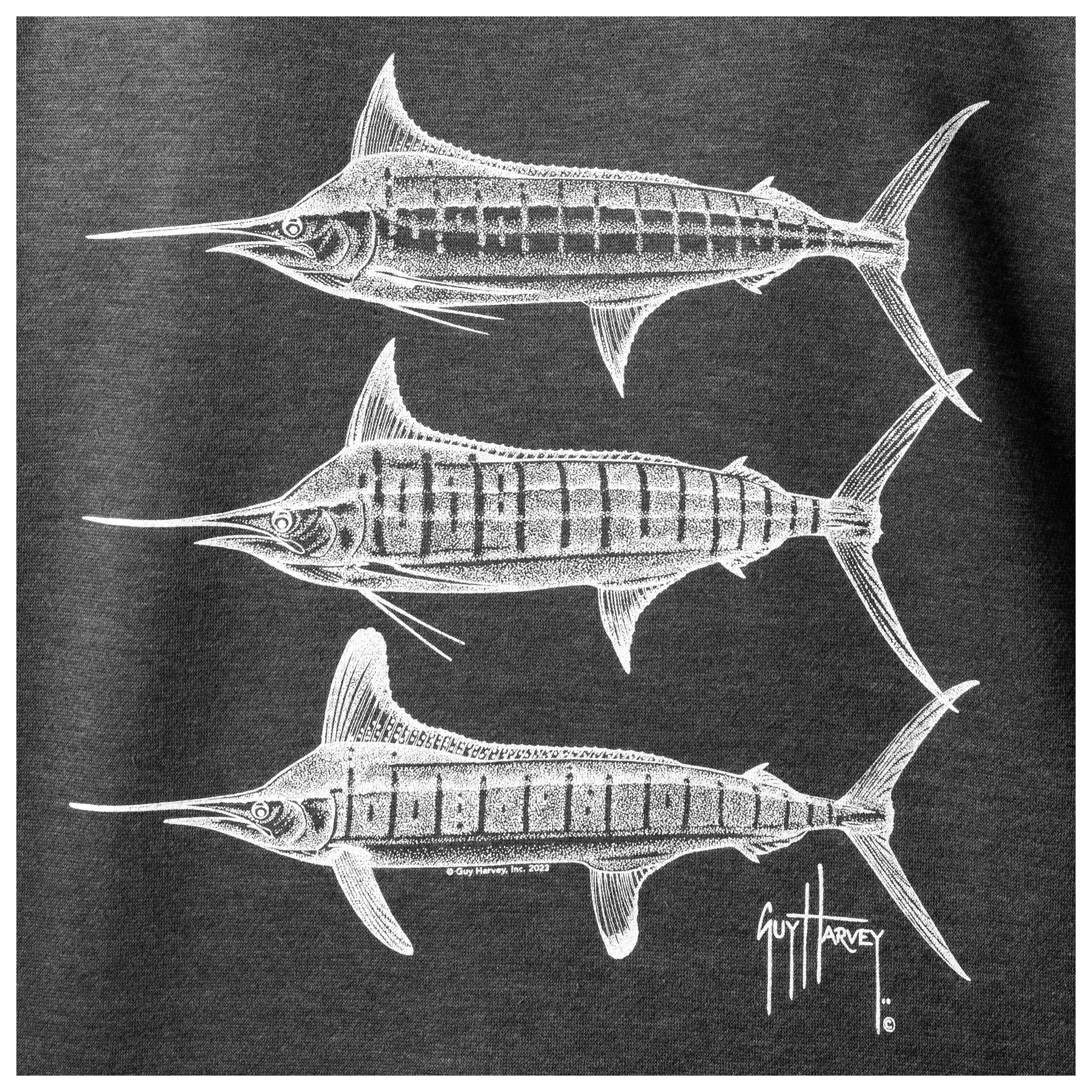 Close-up of three white marlin line-art graphics designed by Guy Harvey on the back of a dark gray fishing fleece hoodie.