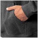 Close-up of a hand in the front pocket of a dark gray Guy Harvey fishing fleece hoodie.