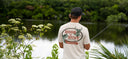 A guy wearing a Guy Harvey Hook & Hunt HarborLite T-Shirt in beige