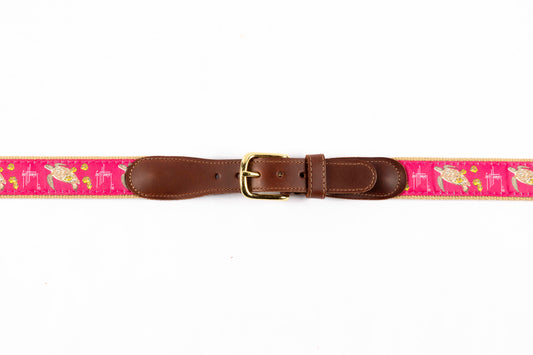 Guy Harvey men's Sea Turtle leather tab belt with bright pink needlepoint sea turtle design and brass buckle.