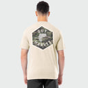 Man wearing a beige Guy Harvey t-shirt with a bass camo design on the back against a white background