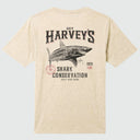 A heather beige short-sleeve t-shirt showing the back graphic, which features a shark illustration and the text 'GUY HARVEY'S SHARK CONSERVATION SAVE OUR SEAS'.