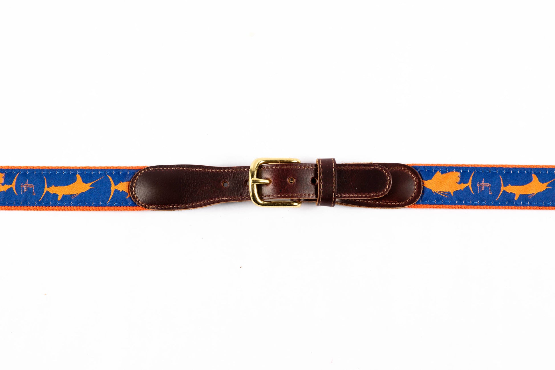 Guy Harvey men's Three Billfish leather tab belt with royal blue needlepoint billfish silhouettes and brass buckle.