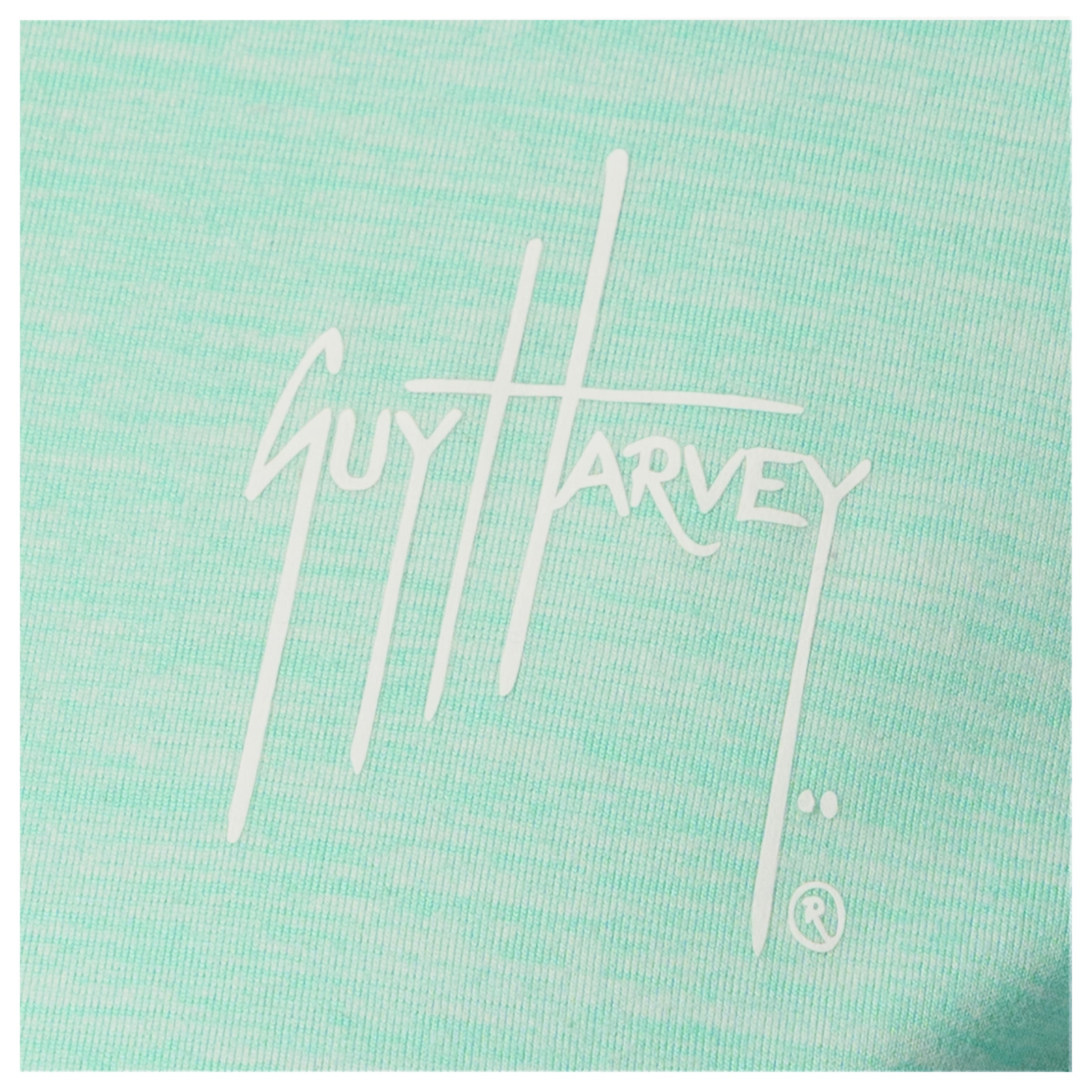 Guy Harvey chest logo close-up on green fleece