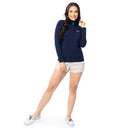 Full body view of woman wearing Guy Harvey Navy Pullover with light shorts