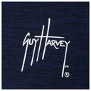 Guy Harvey chest logo close-up in white on navy fabric