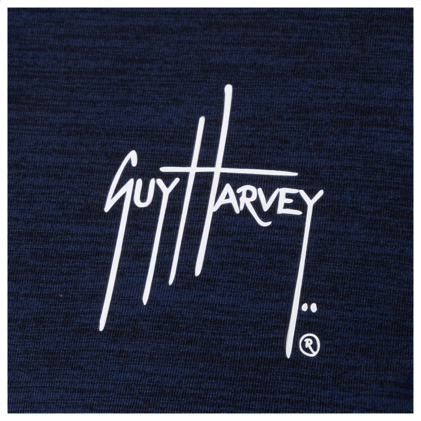 Guy Harvey chest logo close-up in white on navy fabric