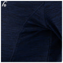 Side seam stitching close-up on navy fleece pullover