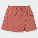 A terracotta-colored wrap-style fishing skort with an elastic drawstring waist, side pockets, and a button detail on the right pocket, shown against a light gray background.