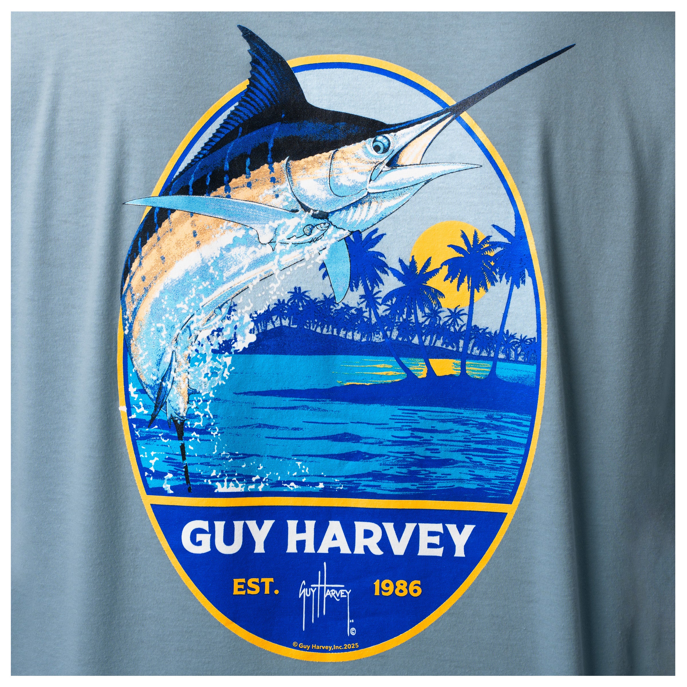 Detailed view of tropical marlin and palm tree sunset artwork on back of Guy Harvey Men’s Long Sleeve T-Shirt