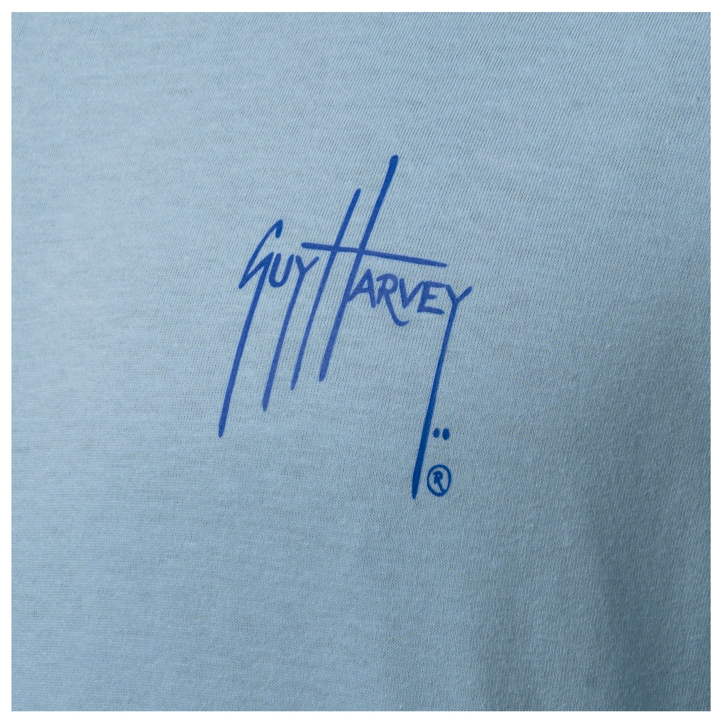 Close-up of chest Guy Harvey signature logo on Men’s Blue Hawaiian Long Sleeve Tee