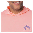 Close-up on the left chest iconic signature from Guy Harvey on the boxed mahi fishing hoodie