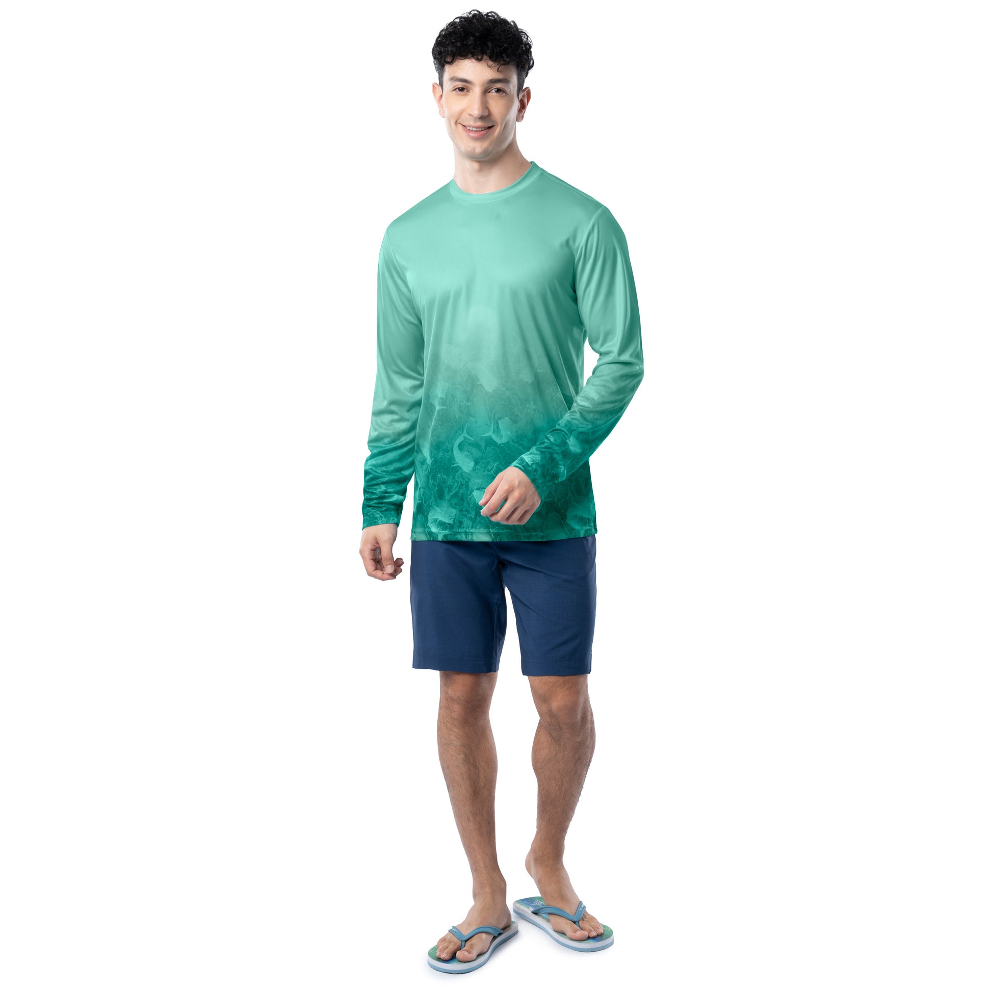 Lifestyle photo of model wearing Guy Harvey Men’s Mahi Bros Fade Green Performance Sun Protection Long Sleeve Top