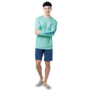 Lifestyle photo of model wearing Guy Harvey Men’s Mahi Hex Performance Sun Protection Top
