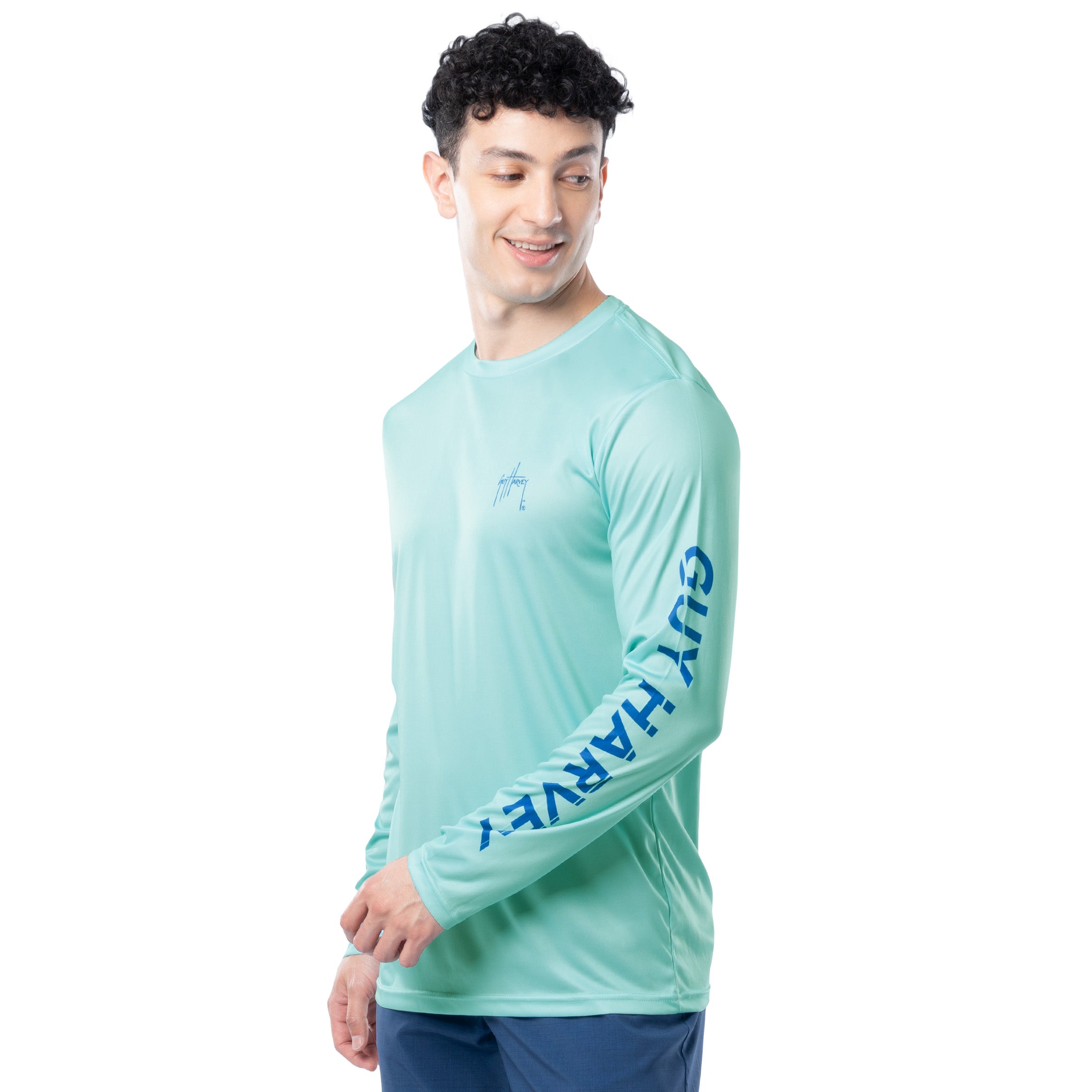 Side profile of Guy Harvey Men’s Mahi Hex Long Sleeve Performance Shirt showing athletic fit