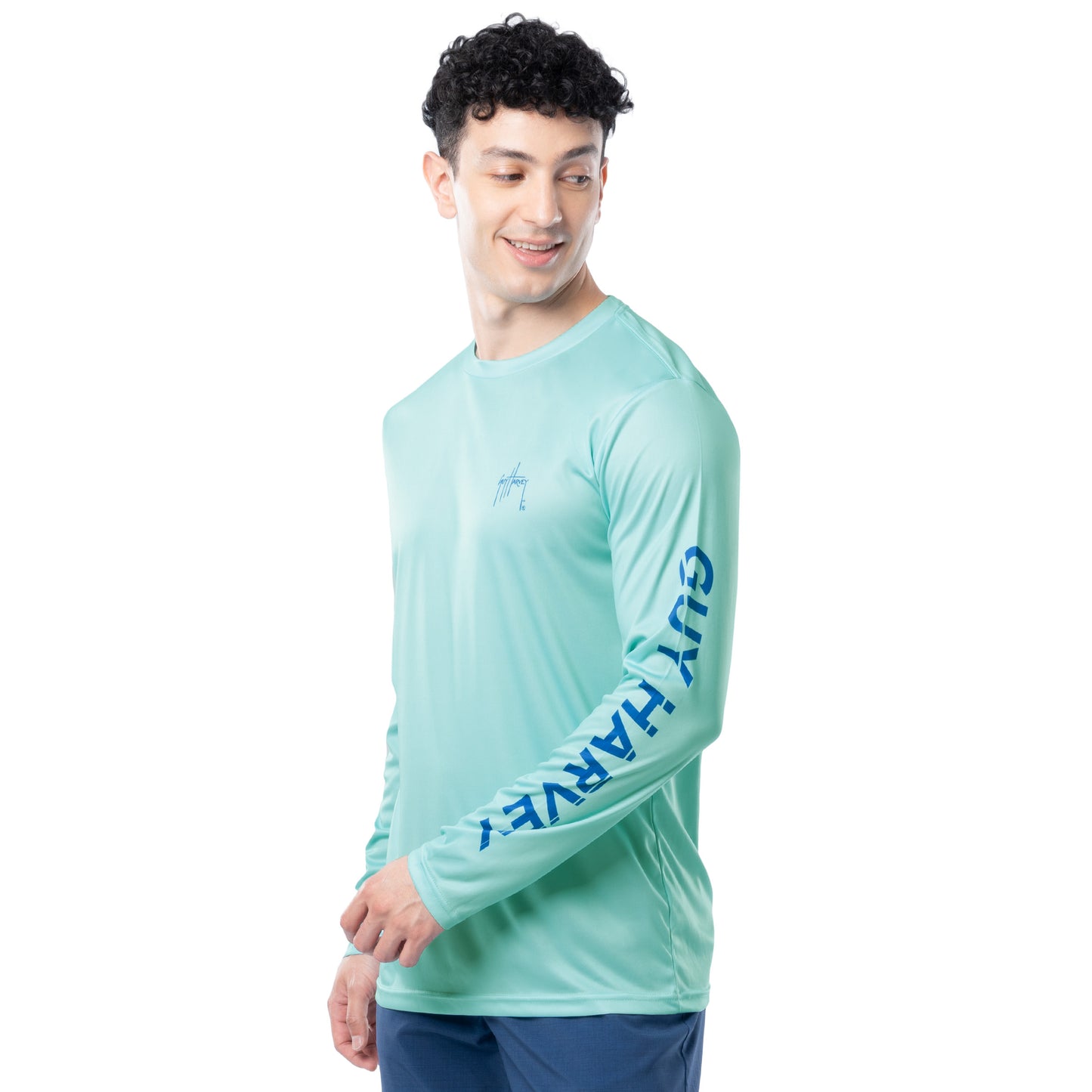 Side profile of Guy Harvey Men’s Mahi Hex Long Sleeve Performance Shirt showing athletic fit