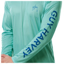 Detail view of the sleeve showing Guy Harvey in bold blue letters.