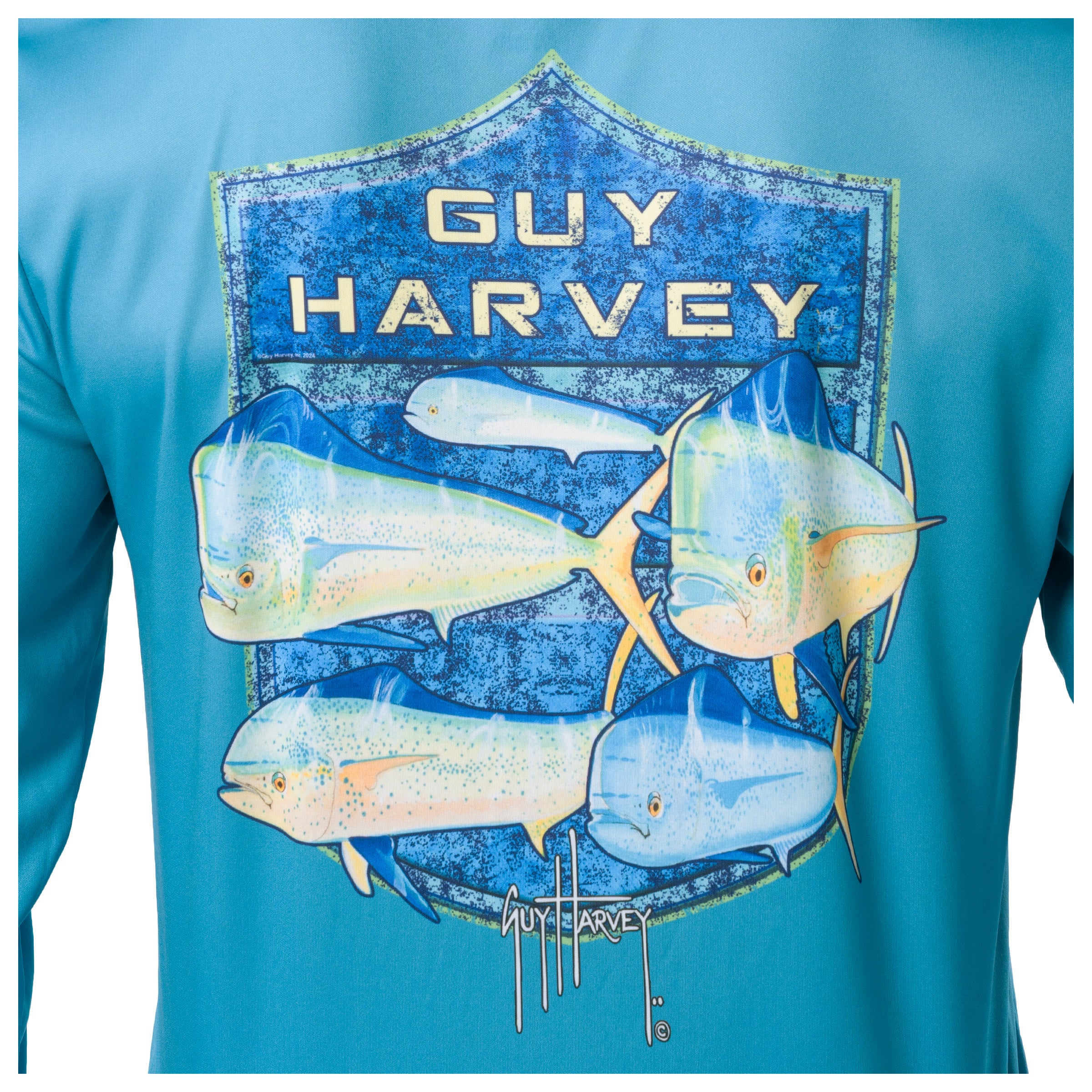 Detailed view of shield-style mahi-mahi artwork on back of Guy Harvey Men’s Performance Top