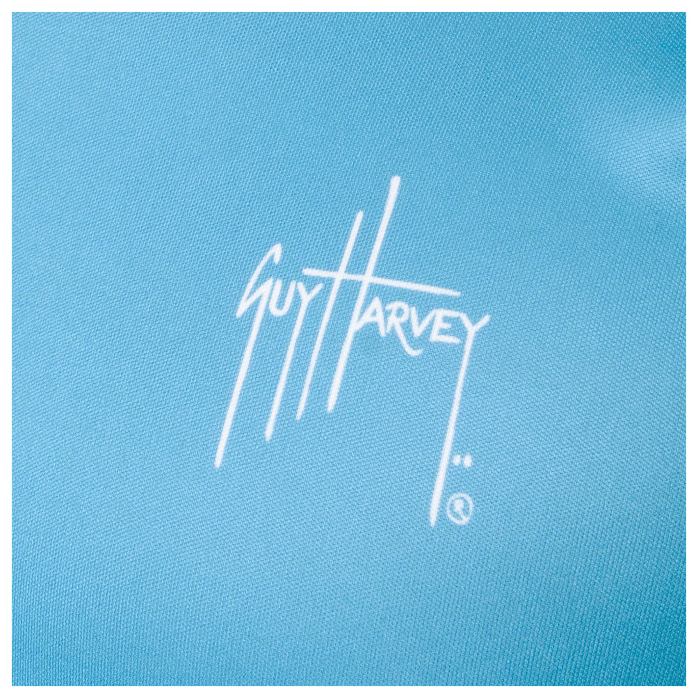 Close-up of chest Guy Harvey signature logo on Men’s Mahi Shield Performance Long Sleeve Top