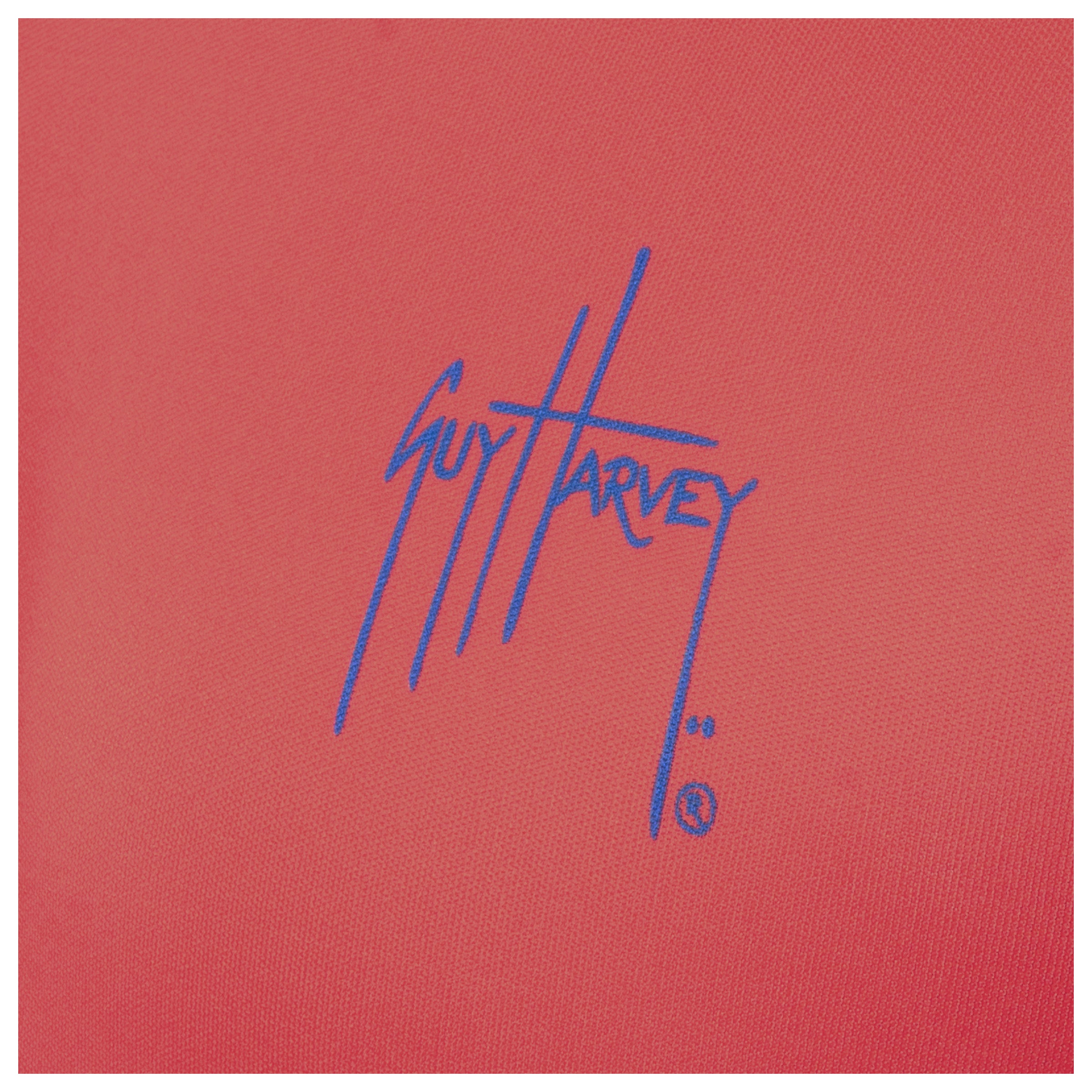 Close-up of chest Guy Harvey signature logo on Men’s Marlin Americana Performance Long Sleeve Top