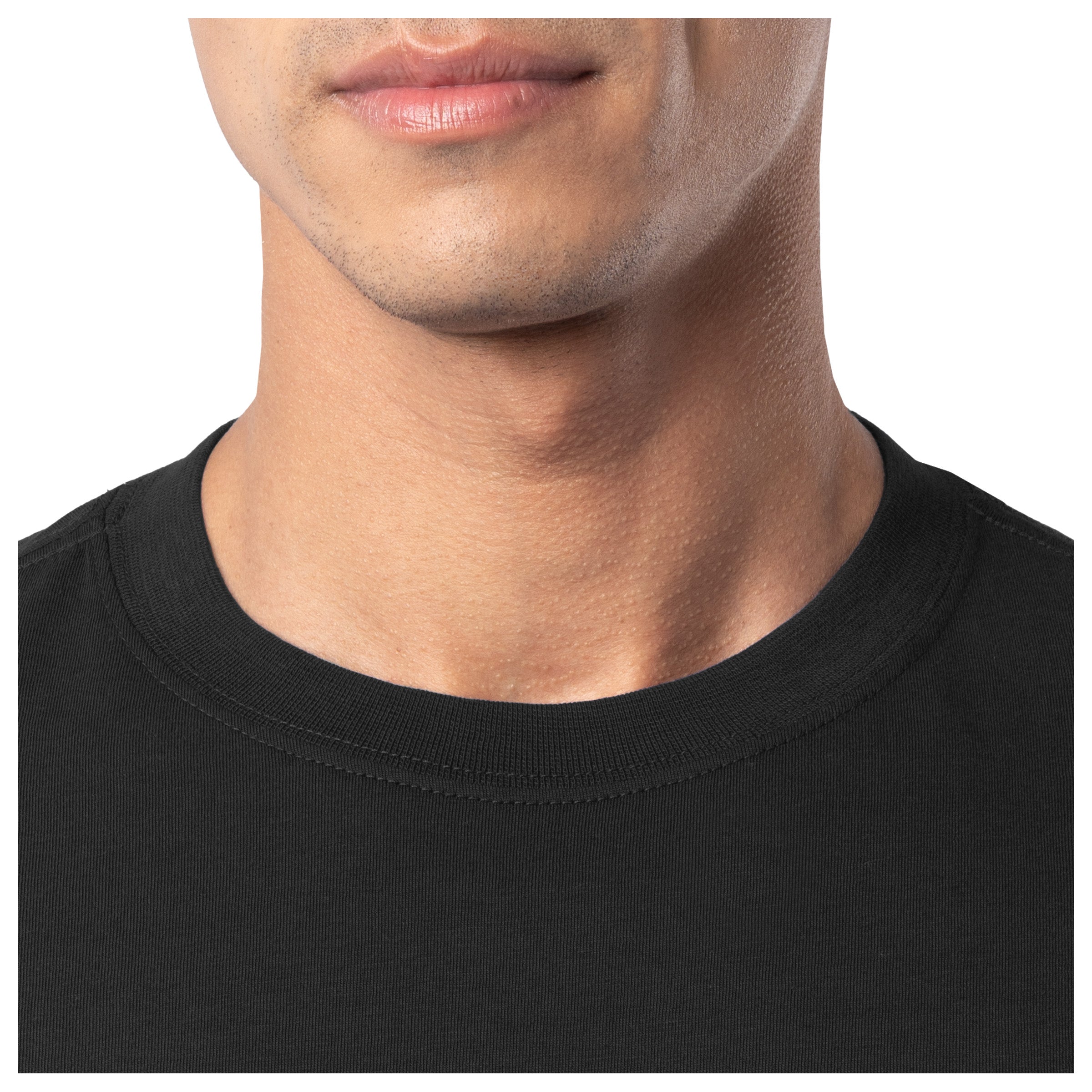 Close-up of a person wearing a black shirt with a plain background