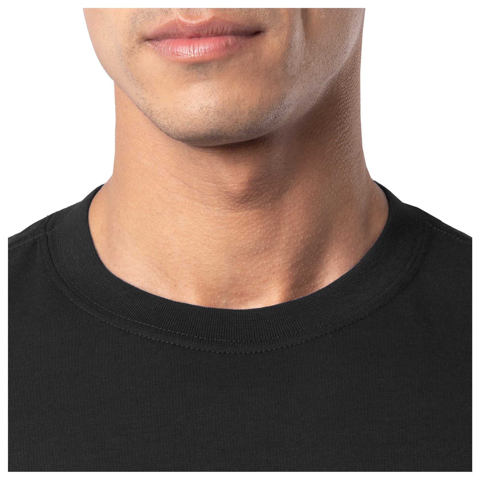 Close-up of a person wearing a black shirt with a plain background