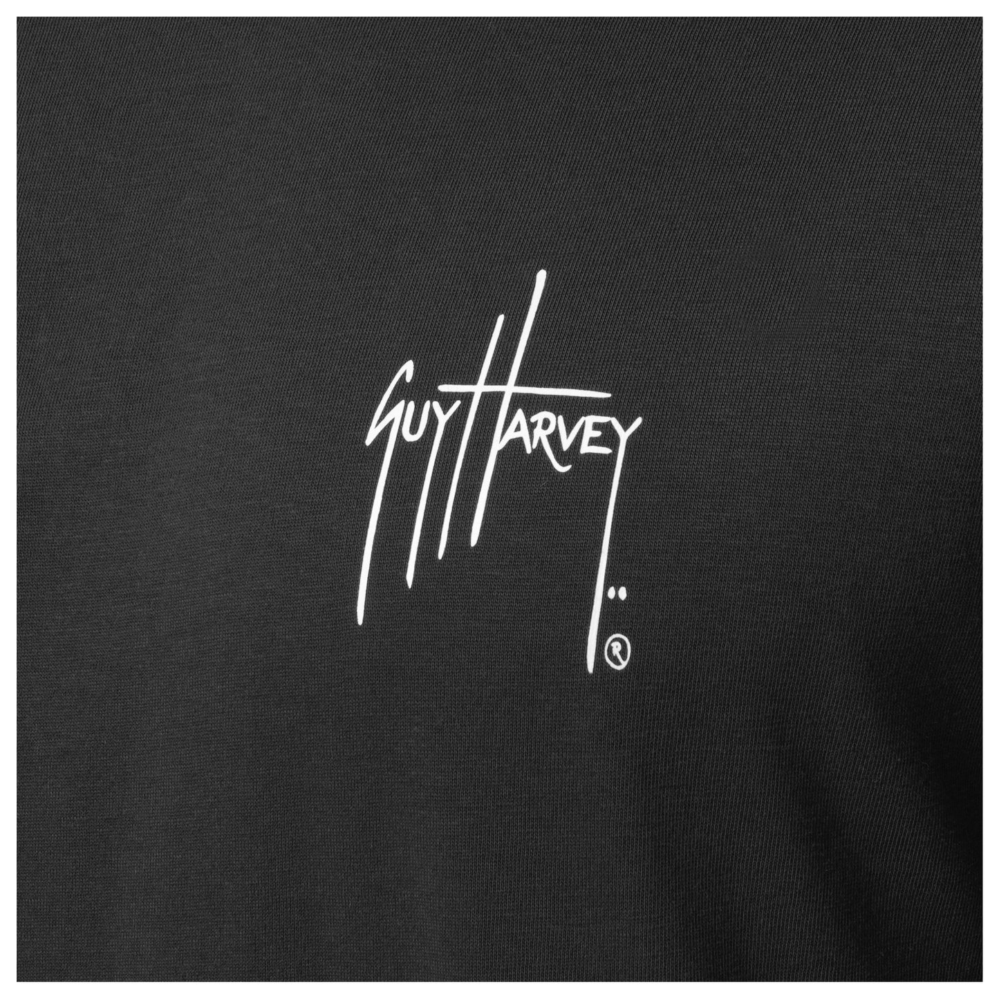 Close-up of chest Guy Harvey signature logo on Men’s Redfish Tailing Long Sleeve Tee
