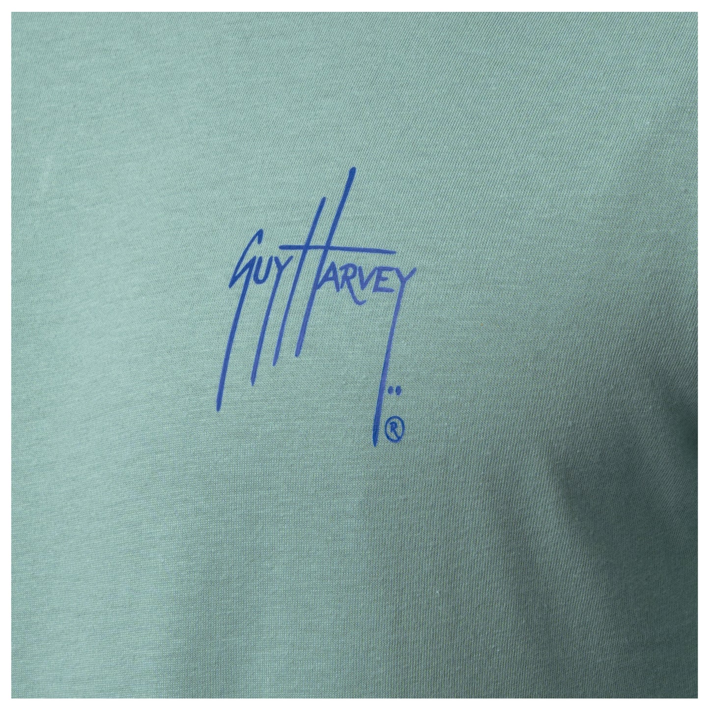 Close-up of chest Guy Harvey signature logo on Men’s Saltwater Paradise Long Sleeve Tee