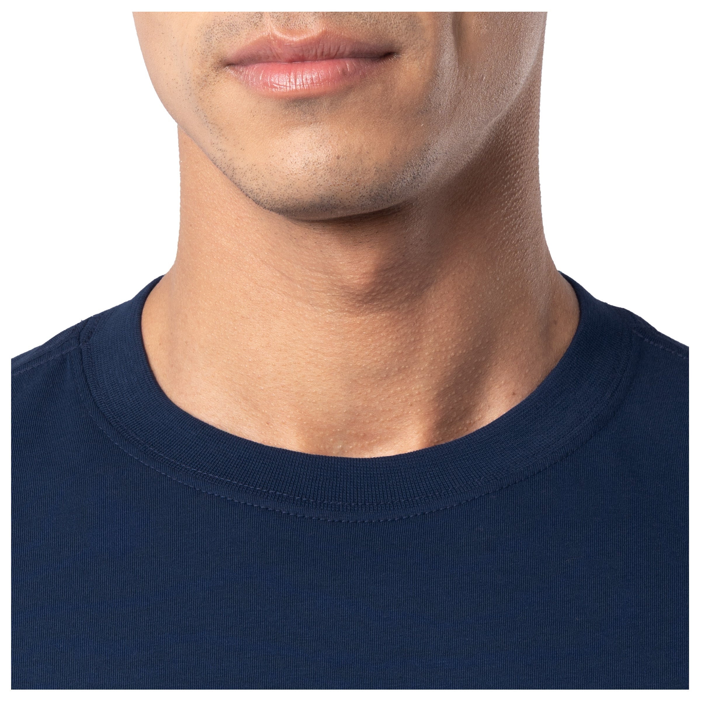 Close-up of a person wearing a navy blue shirt with a plain background